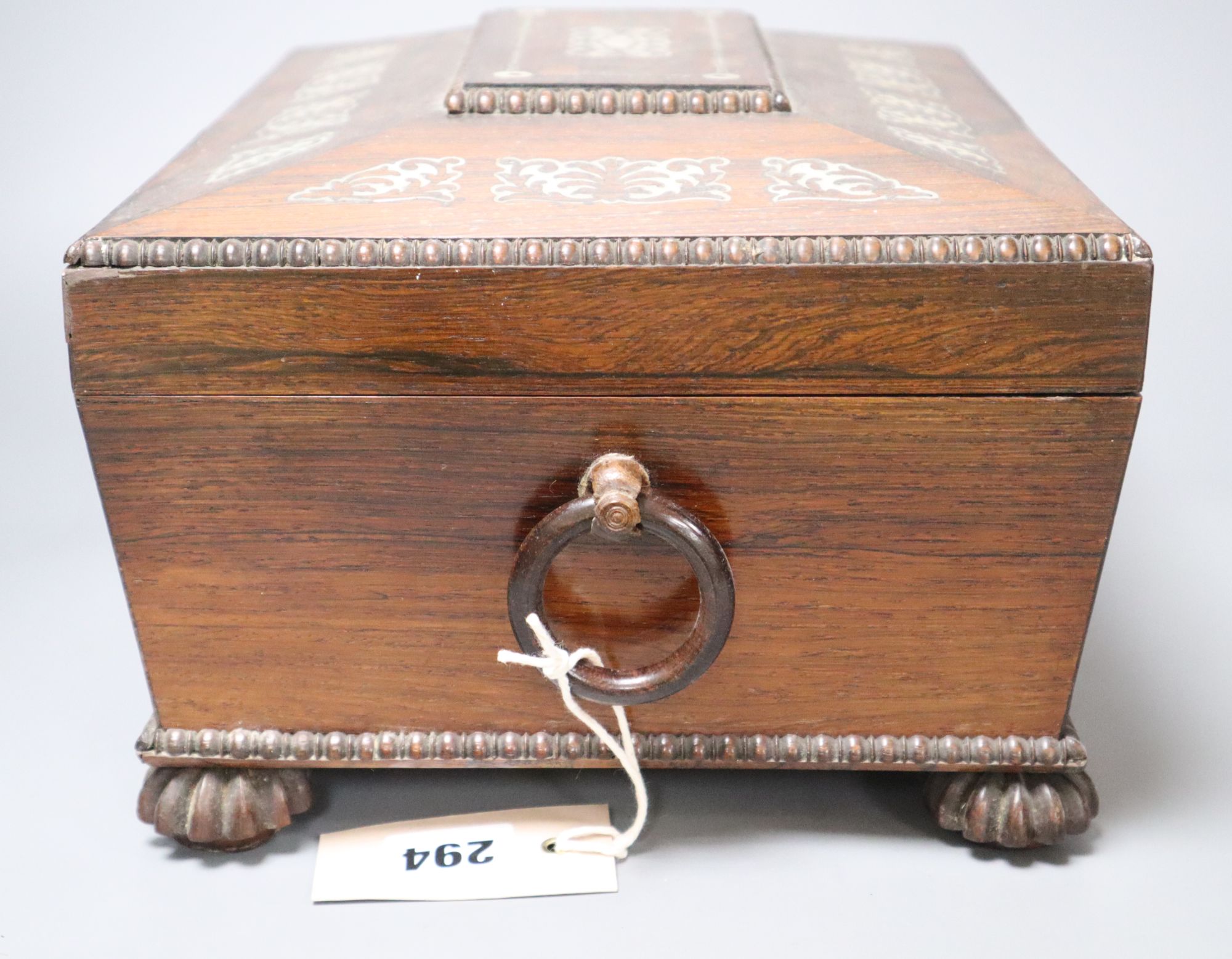 A Victorian mother of pearl-inlaid rosewood sarcophagus work box, width 31cm height 18cm